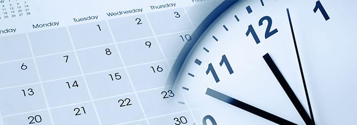 How-Long-Does-It-Take-for-Stem-Cell-Therapy-to-Work Close-up of a calendar grid and an overlapping clock, symbolizing scheduling and time management.