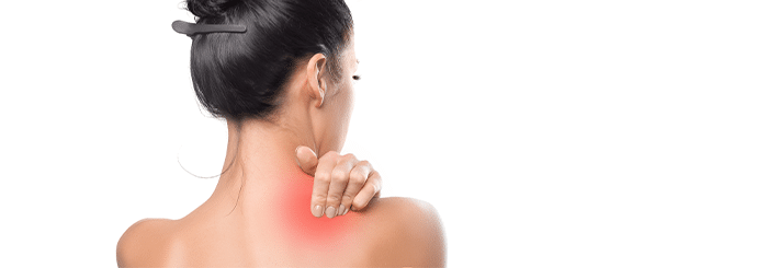 Back view of a person touching the neck, with a red irritated area at the base of the neck indicating pain.
